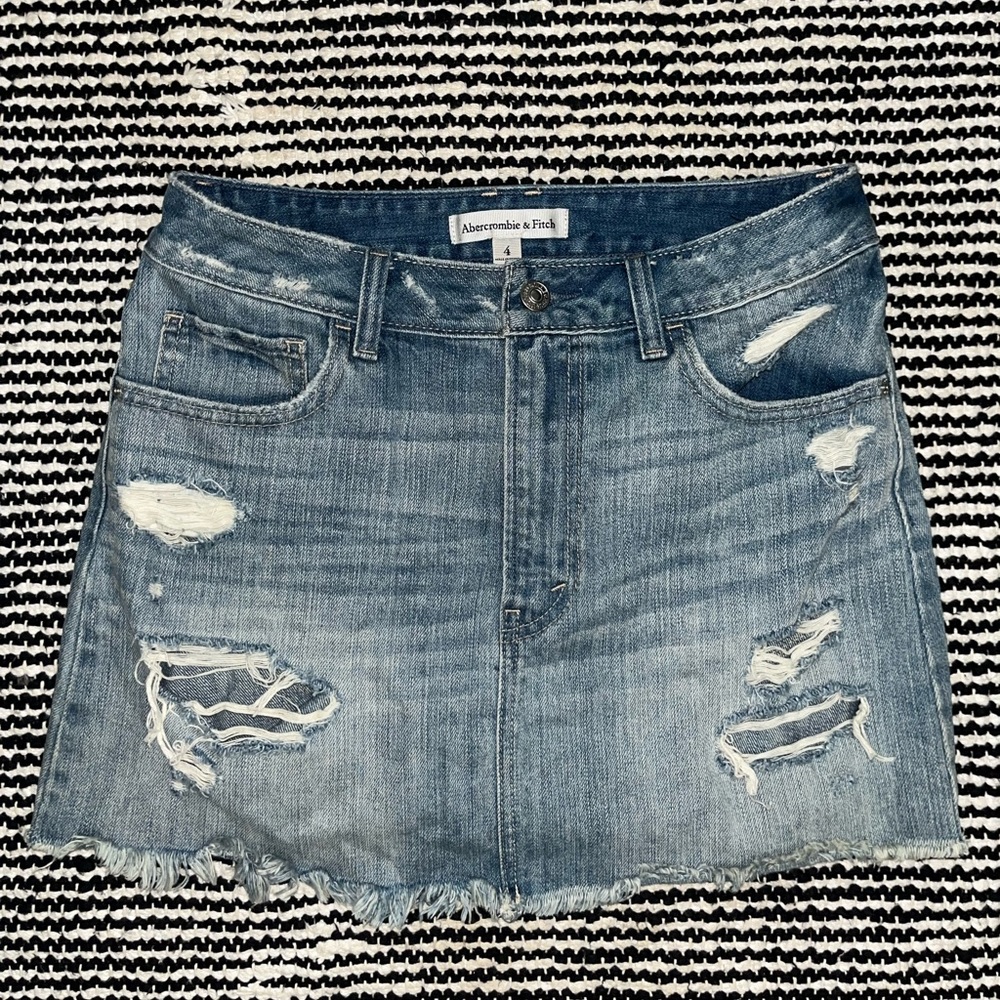 Distressed denim miniskirt
